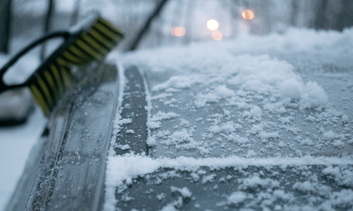 Clearing snow from a car with the engine running - is it possible